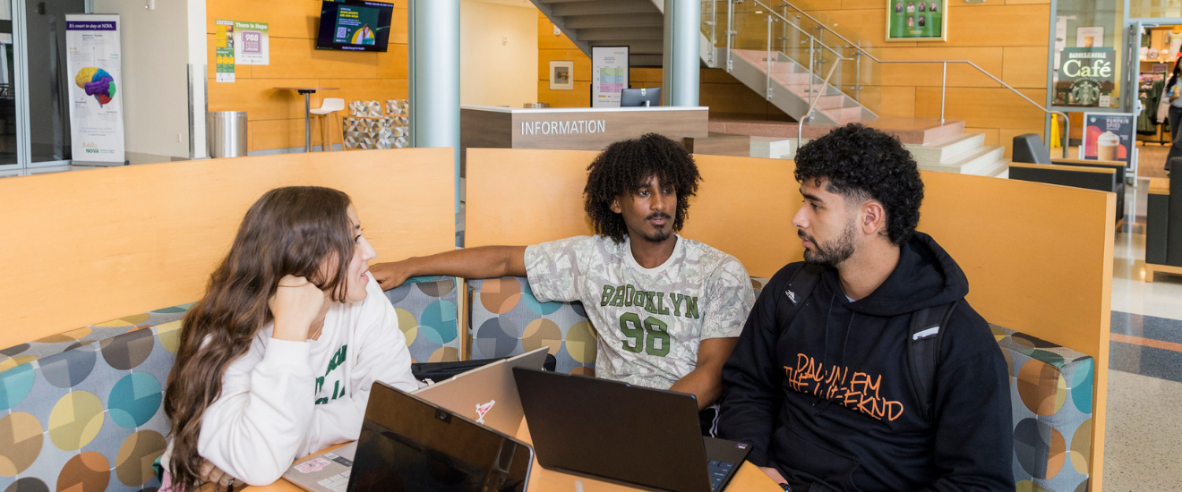 Students sitting together on campus